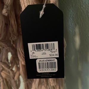 Beige scarf, comes from non-smoking home.